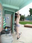 stretching in Pirates swimsuit by designer Ami Sanzuri