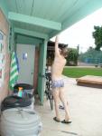 stretching in Pirates swimsuit by designer Ami Sanzuri