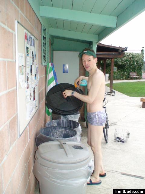 putting out the trash in a Pirates swimsuit by designer Ami Sanzuri