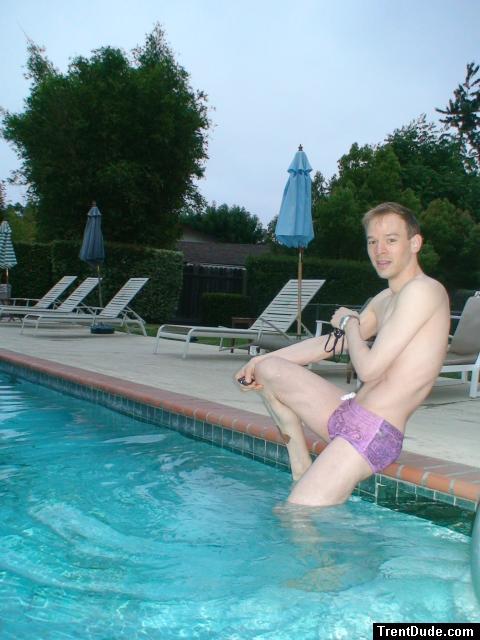 wearing a Ami Sanzuri Swimwear Square Cut Trunk (MCMX Purple Size Medium) (pouch)