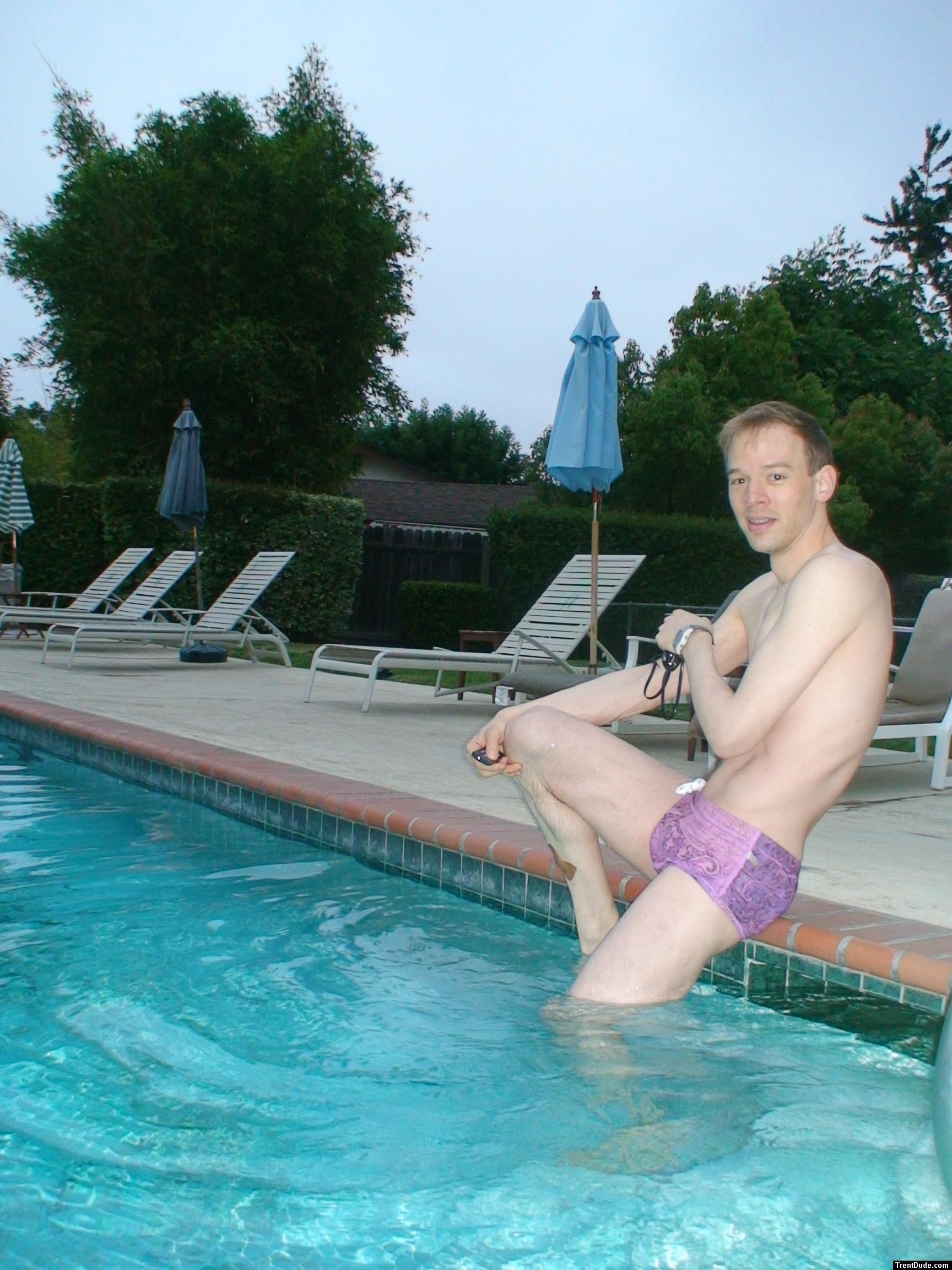 wearing a Ami Sanzuri Swimwear Square Cut Trunk (MCMX Purple Size Medium) (pouch)