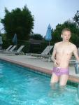 wearing a Ami Sanzuri Swimwear Square Cut Trunk (MCMX Purple Size Medium)