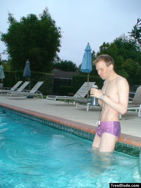 wearing a Ami Sanzuri Swimwear Square Cut Trunk (MCMX Purple Size Medium)