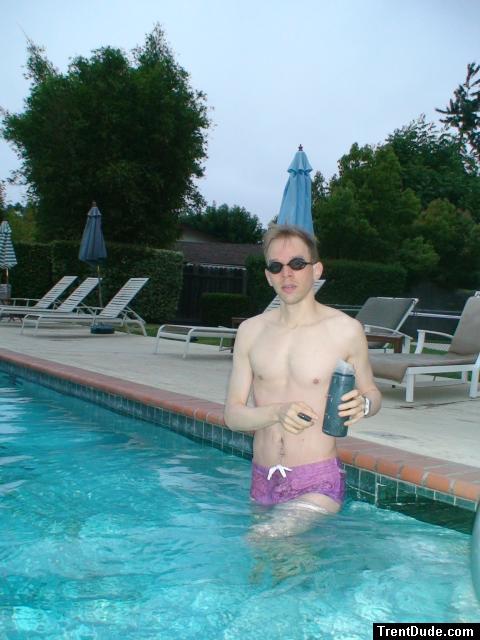 wearing a Ami Sanzuri Swimwear Square Cut Trunk (MCMX Purple Size Medium)