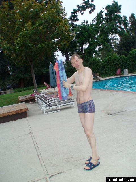 The Ami Sanzuri psychedelic square-cut swimsuit features low-cut styling and square leg openings in a psychedelic floral and pai