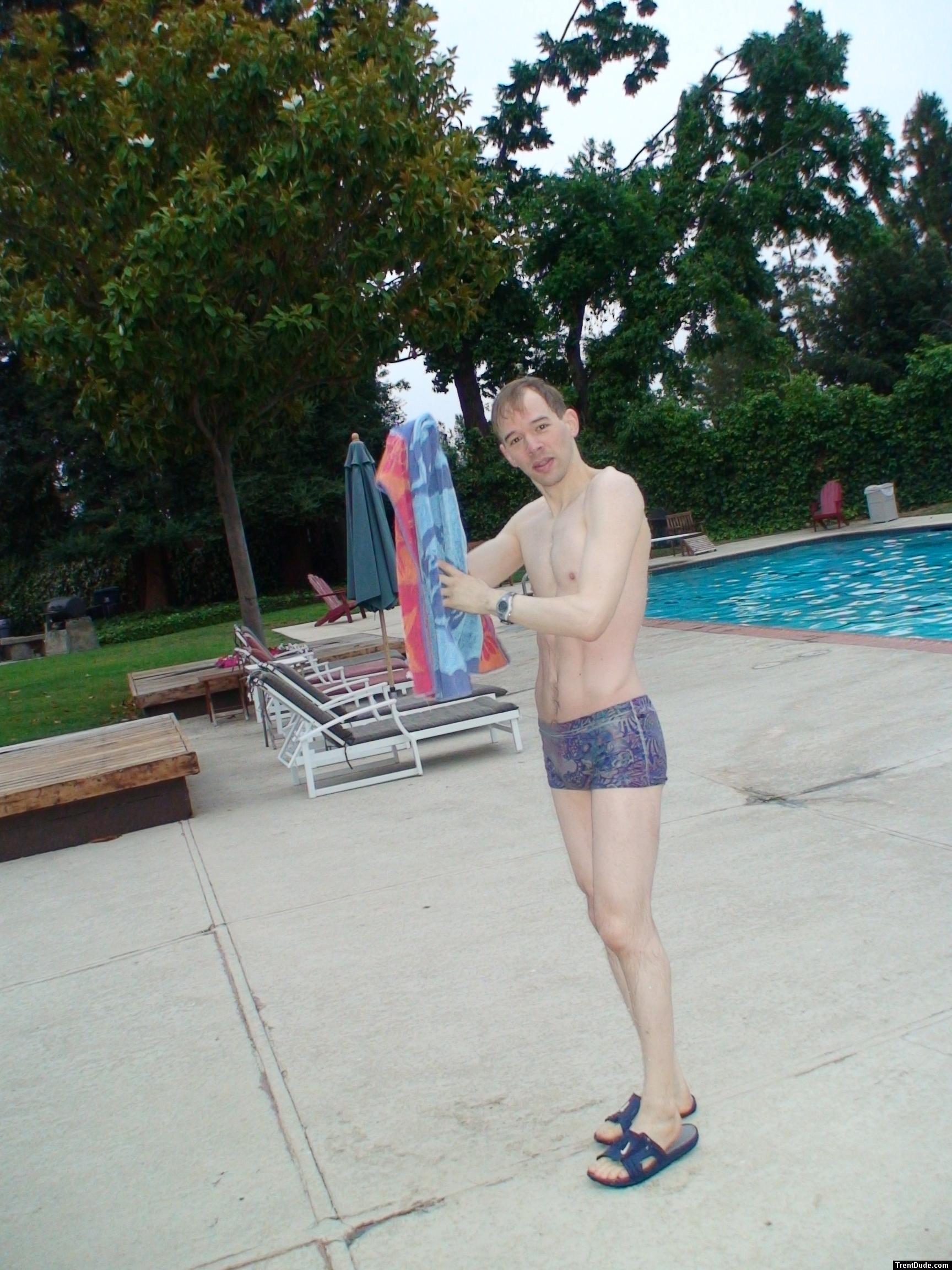 The Ami Sanzuri psychedelic square-cut swimsuit features low-cut styling and square leg openings in a psychedelic floral and pai