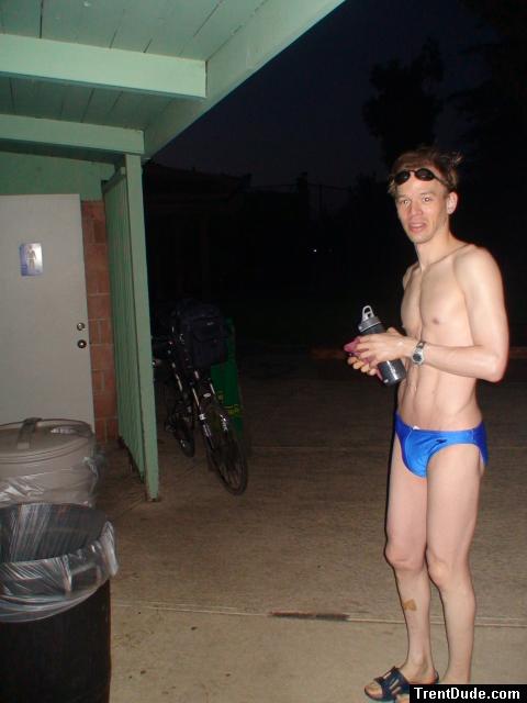 drinking in a blue speedo (pouch)