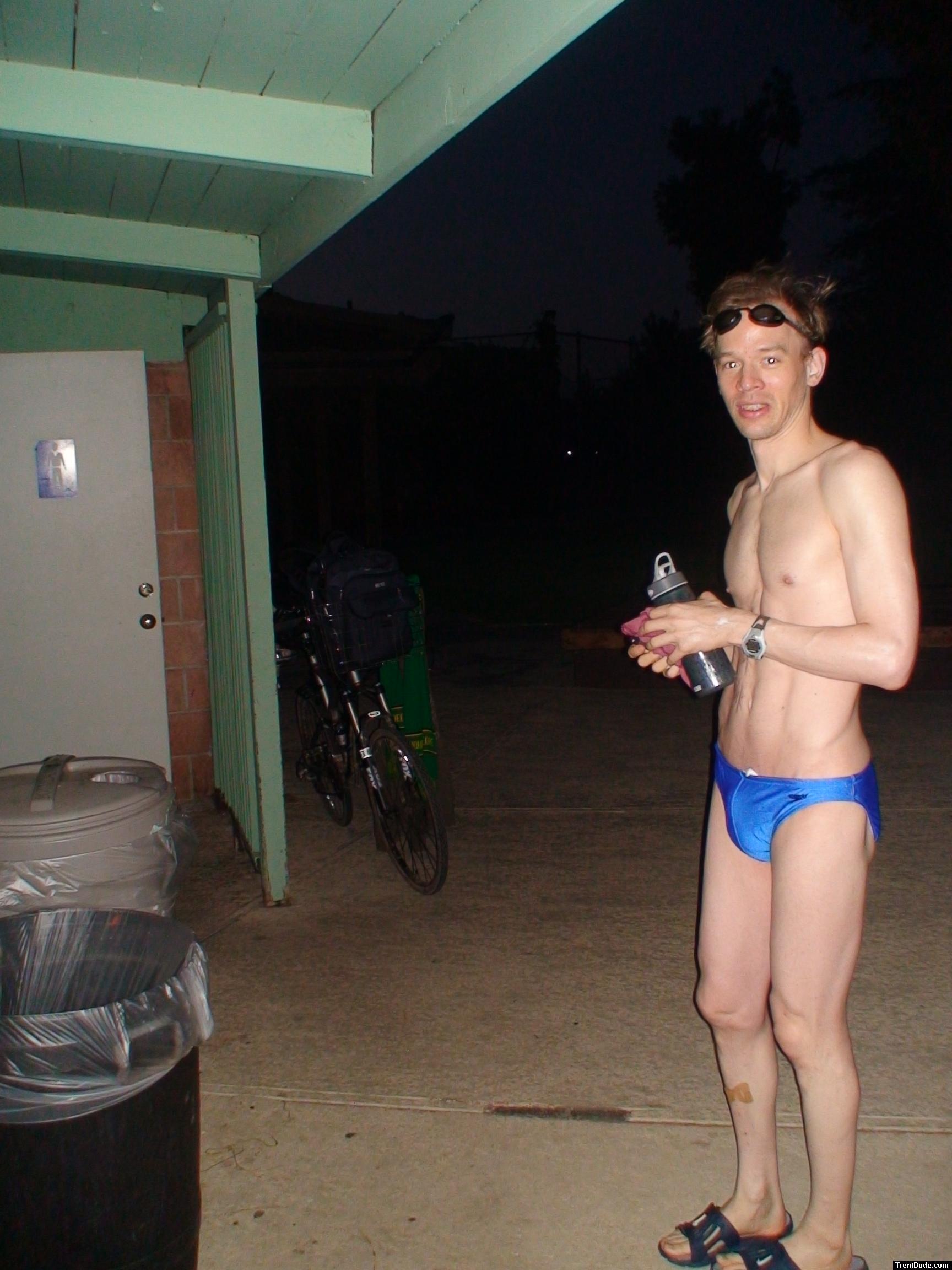 drinking in a blue speedo (pouch)