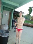 smiling in a red speedo