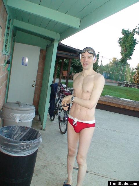 smiling in a red speedo