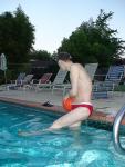 red speedo, with a white speedo underneath
