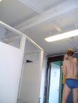 Blue Patagonia brief in the swim locker room (rear)