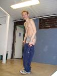 Wearing grey Tommy Hilfiger briefs in the locker room underneath Adidas sweats