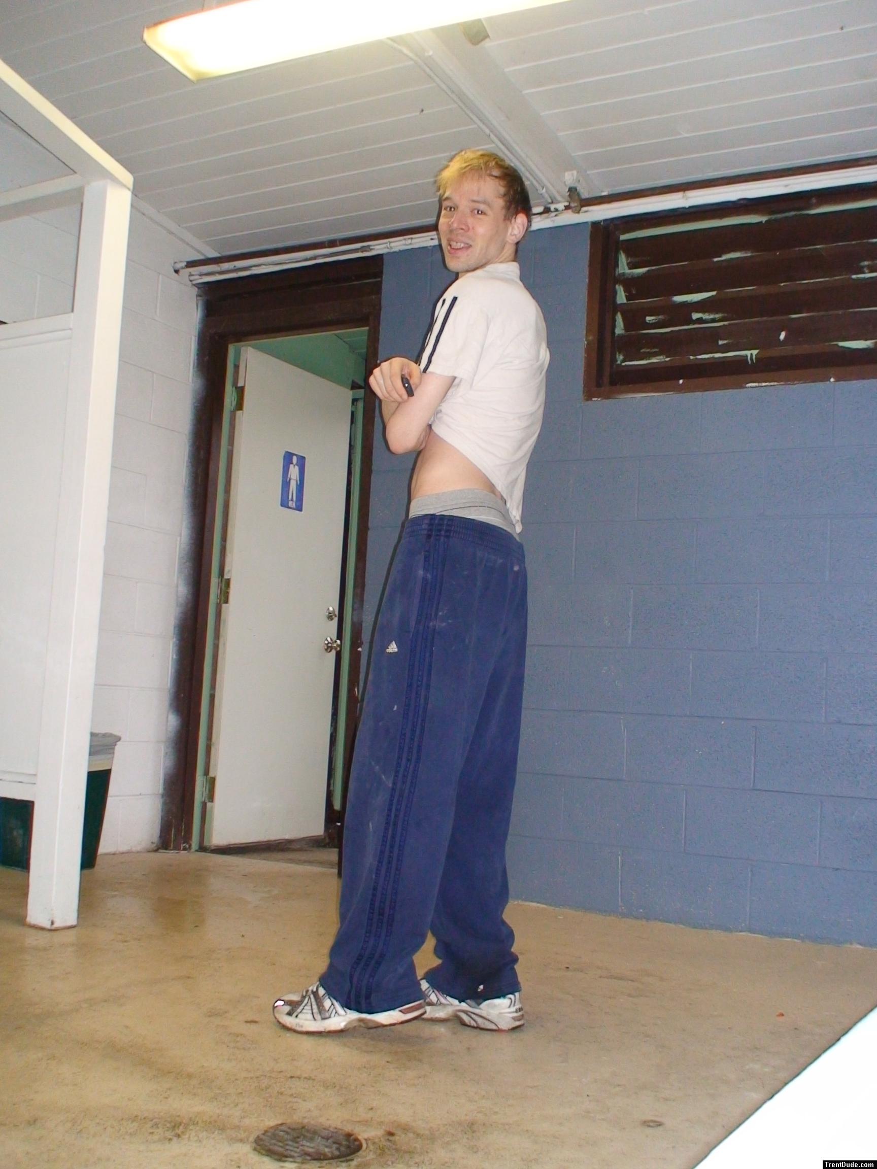 Adidas sweats over grey tommy underwear