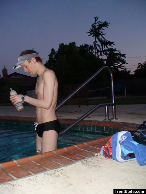 black speedo and drinking an antioxidant smoothie before the morning swim