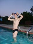 Putting goggles on before a morning swim, black speedo (smile)