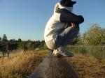 Sweats at the park (wearing a hood for sun protection (rear)