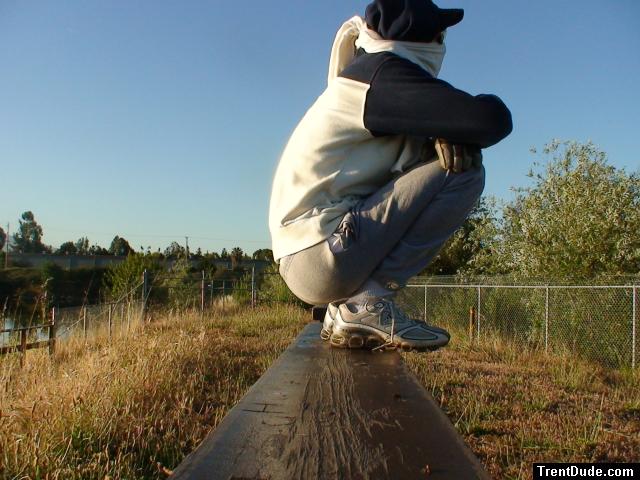 Sweats at the park (wearing a hood for sun protection (rear)