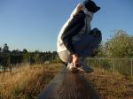 Sweats at the park (wearing a hood for sun protection (rear)