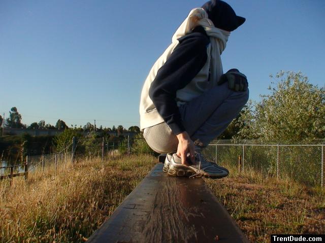 Sweats at the park (wearing a hood for sun protection (rear)