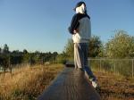 Sweats at the park (wearing a hood protection from UVA/UVB rays from sun) (rear)