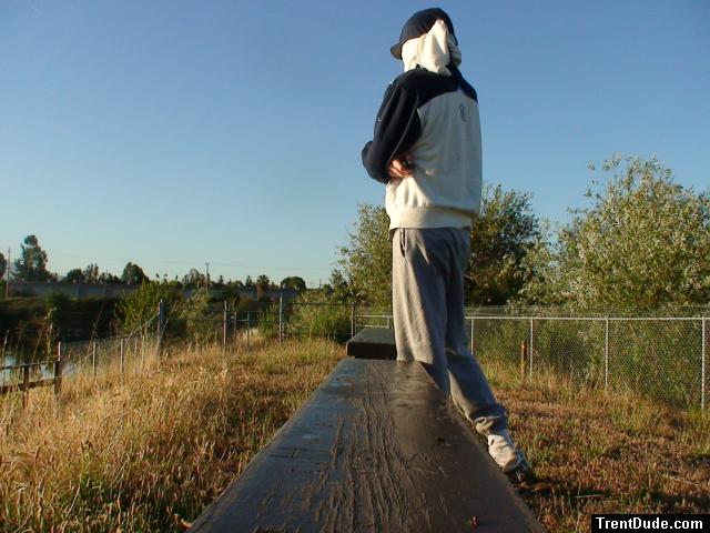Sweats at the park (wearing a hood protection from UVA/UVB rays from sun) (rear)