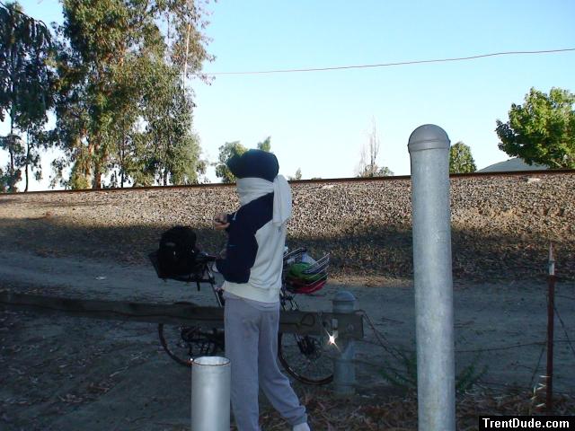Sweats at the park (face wrapped in a scarf and hat)