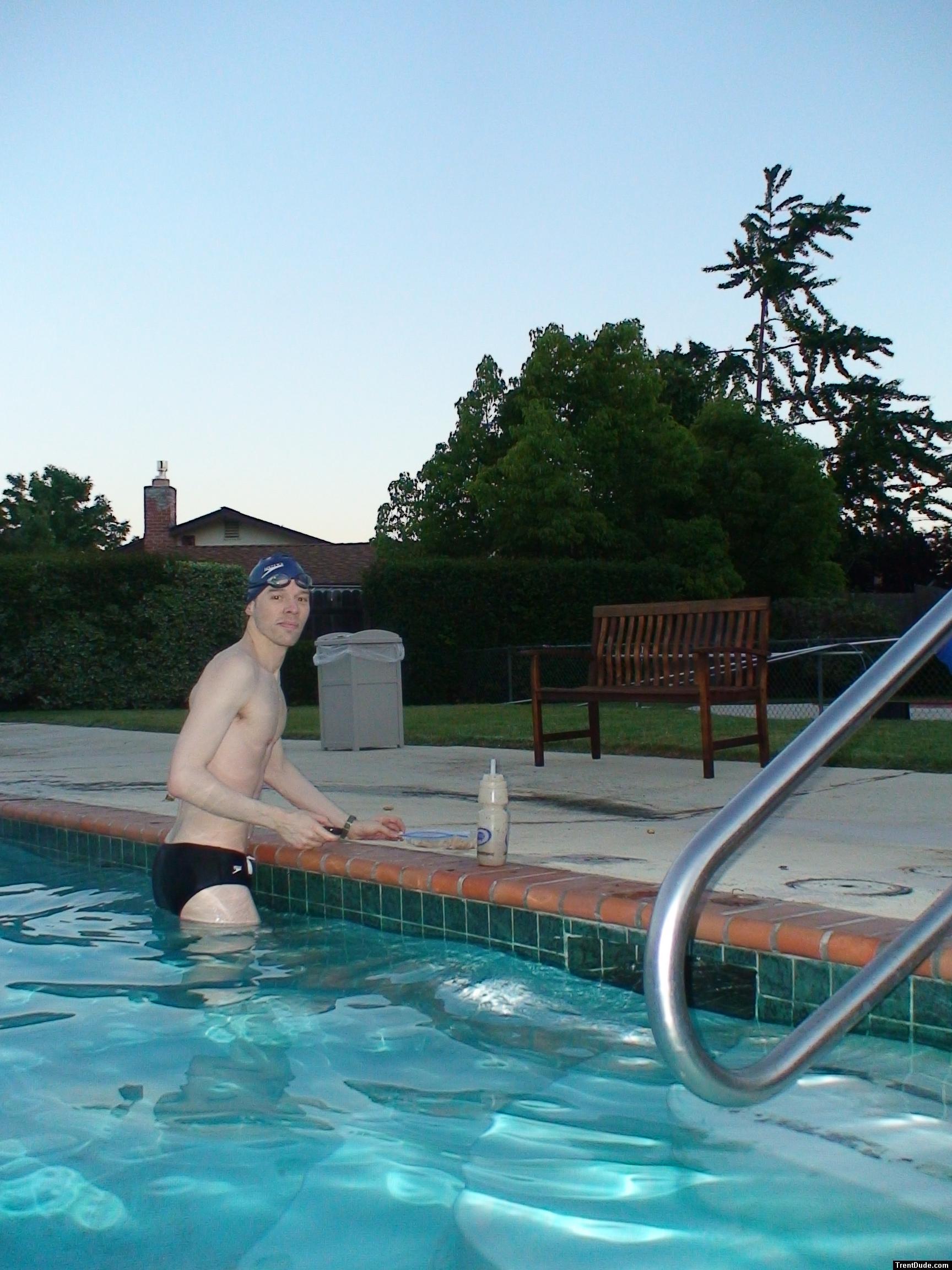 Black speedo at the swimming pool, blueberry antioxidant drink that he sips on throughout the swim workout