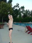 Toned swimmer in a black speedo