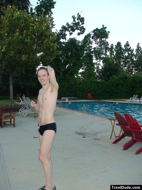 Toned swimmer in a black speedo