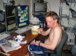 Cute computer student with large monitors