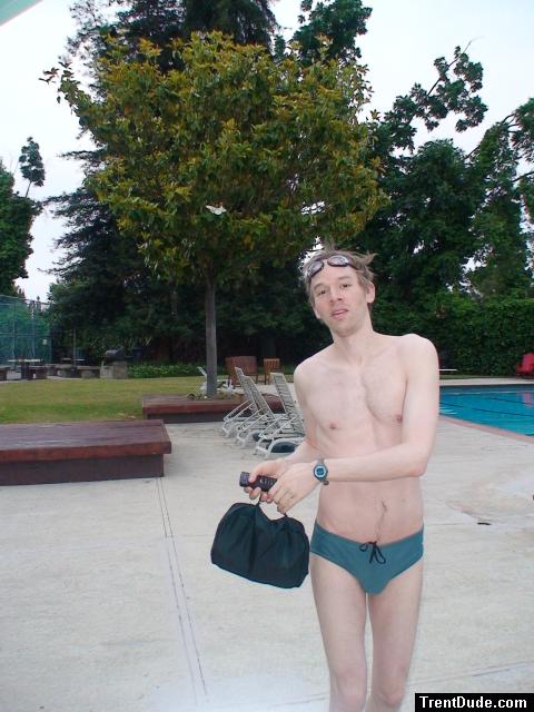 green swim bag and a green nike speedo