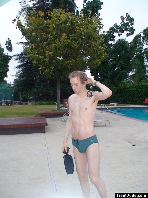 green swim bag and a green nike speedo