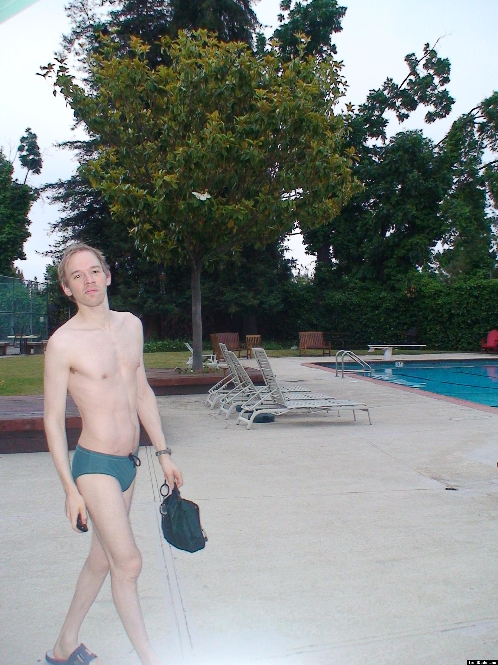 green swim bag and a green nike speedo