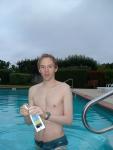 Green Nike speedo swim brief at the pool, dermaswim lotion