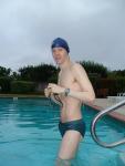 Green Nike speedo swim brief at the pool