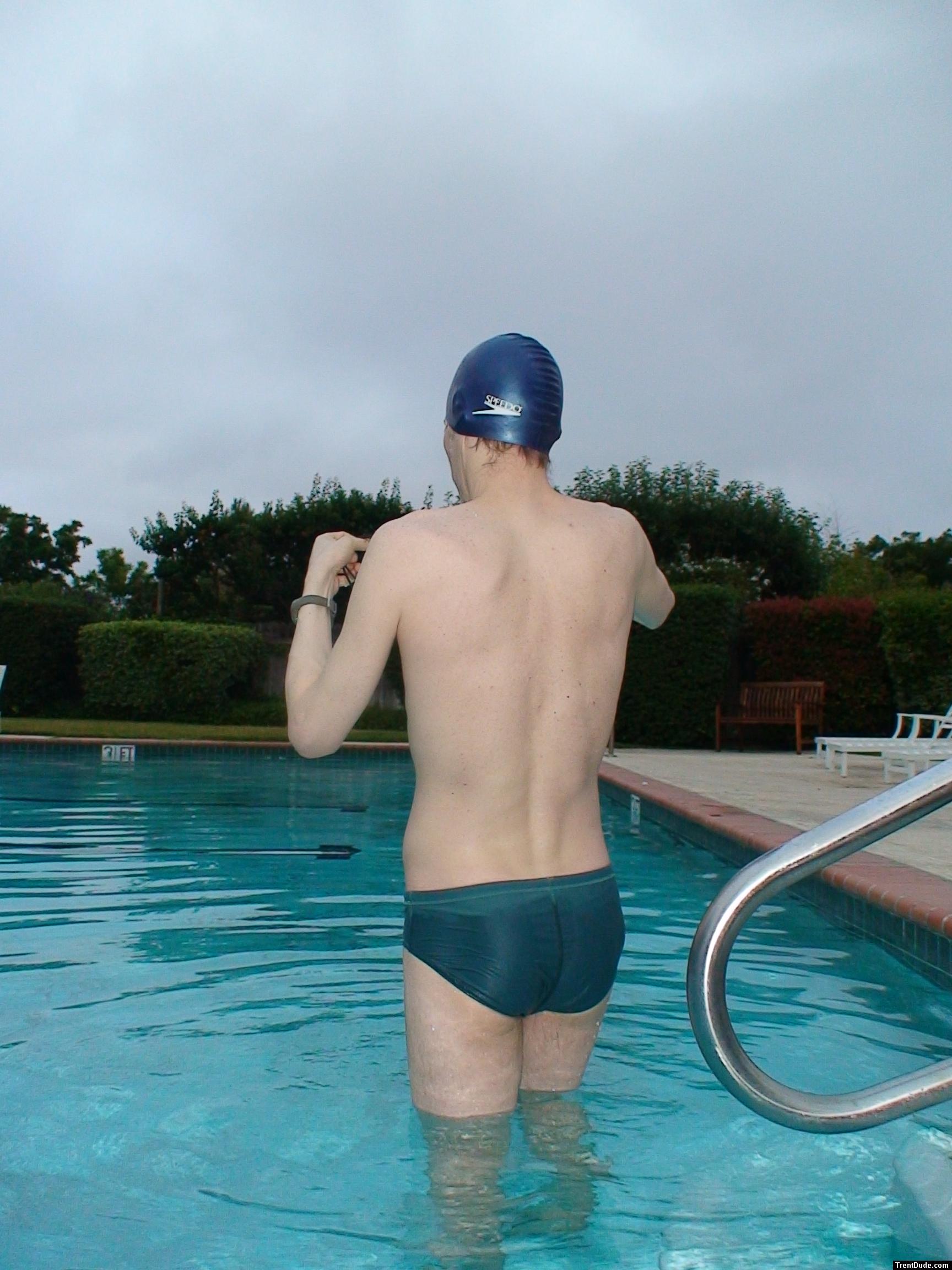 Green Nike speedo swim brief at the pool