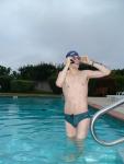 Green Nike speedo swim brief at the pool