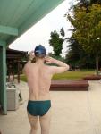Green Nike speedo swim brief at the pool