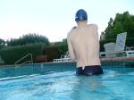 wearing a Nike black/blue speedo swim brief