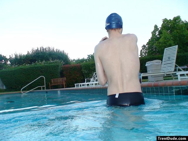 wearing a Nike black/blue speedo swim brief