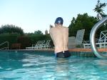 wearing a Nike black/blue speedo swim brief
