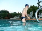 wearing a Nike black/blue speedo swim brief