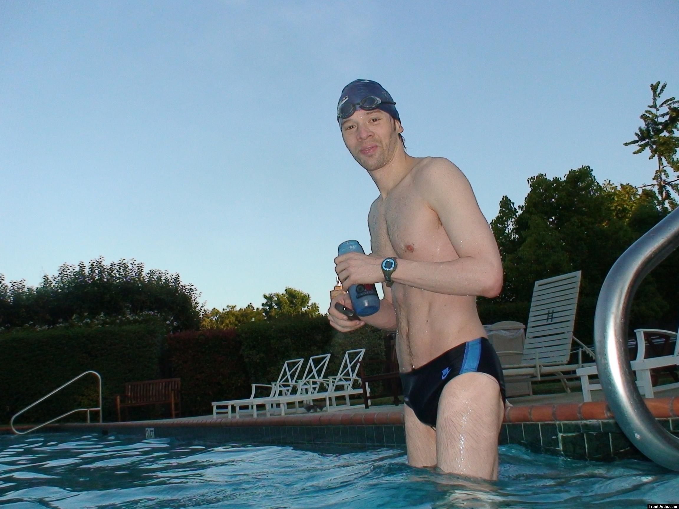 wearing a Nike black/blue speedo swim brief