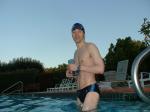 wearing a Nike black/blue speedo swim brief