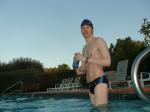 wearing a Nike black/blue speedo swim brief