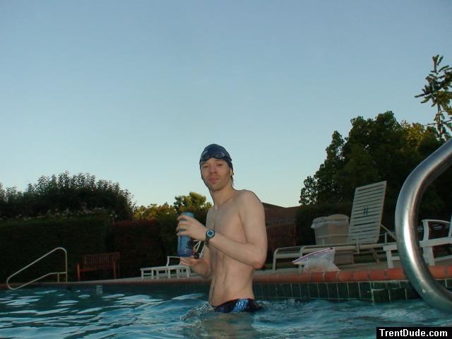 wearing a Nike black/blue speedo swim brief