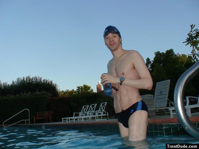 wearing a Nike black/blue speedo swim brief