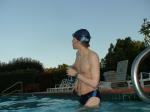wearing a Nike black/blue speedo swim brief