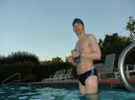 wearing a Nike black/blue speedo swim brief